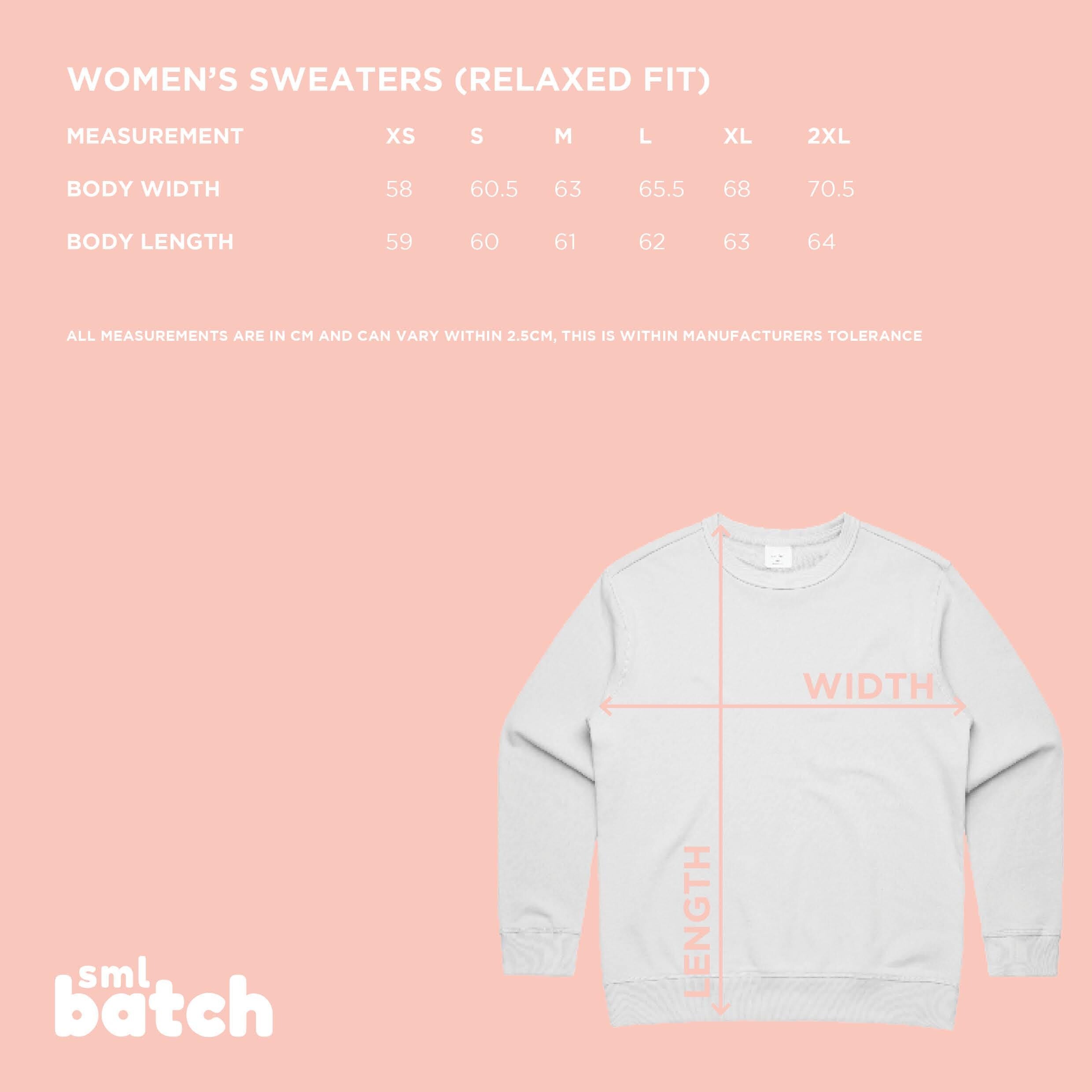 Sizing chart for womens sweaters with a white jumper on a pink background